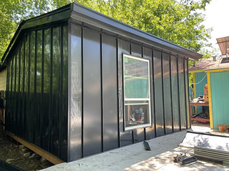 Black standing seam metal wall panels for Metal Roof Installation in Rockville