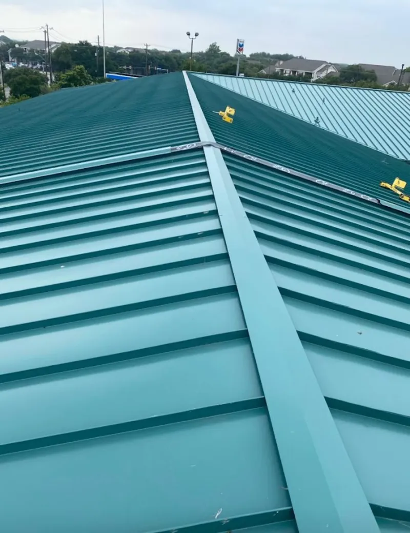 Green commercial metal roof ridge and valley for Metal Roof Repair in Rockville